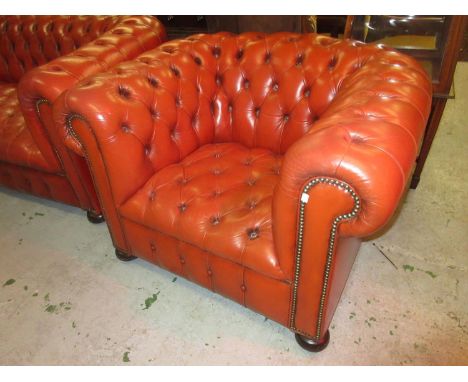 Good quality red buttoned leather upholstered three seat Chesterfield sofa, together with a matching armchairAdditional photo