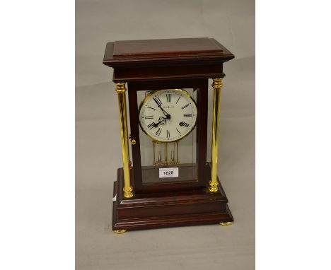 Howard Miller, reproduction mahogany two train mantel clock 