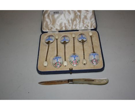 Cased set of six silver and enamel decorated coffee spoons, together with a silver and mother of pearl folding fruit knifeSom