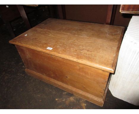 Small 19th Century pine trunk with hinged cover and iron end handles 
