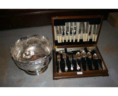 Silver plated punch bowl and ladle together with an oak cased canteen of silver plated cutlery 