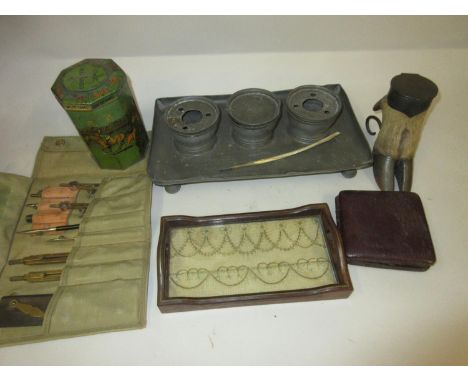 Antique pewter inkstand, a Lyon's tea canister, deer's foot inkwell, travel clock case, drawing instrument set and a miniatur