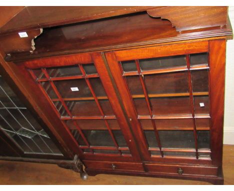 19th Century mahogany bookcase with two bar glazed doors enclosing shelves above two drawers on bracket feet, 37.25ins wide 