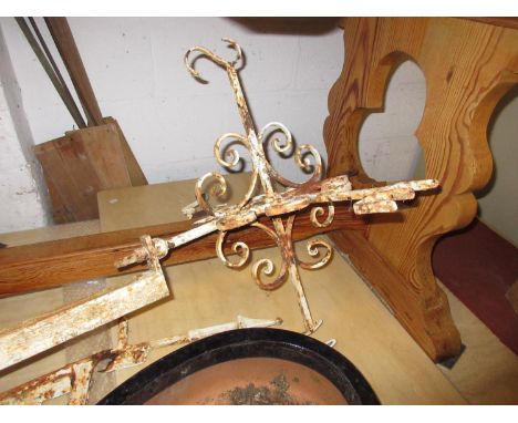 White painted wrought iron weather vane with horse surmount 