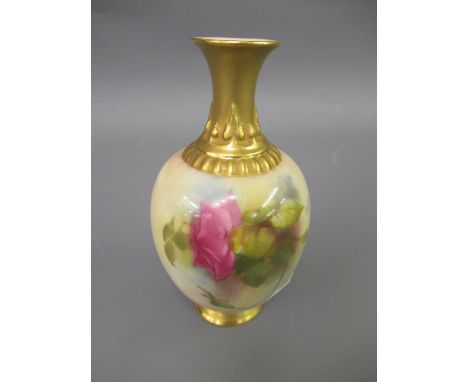 Small Royal Worcester blush ivory and gilt decorated baluster form vase, hand painted with roses, signed E.M. Fields 