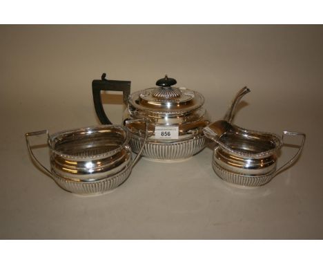 20th Century Birmingham silver oval half fluted design three piece tea service 