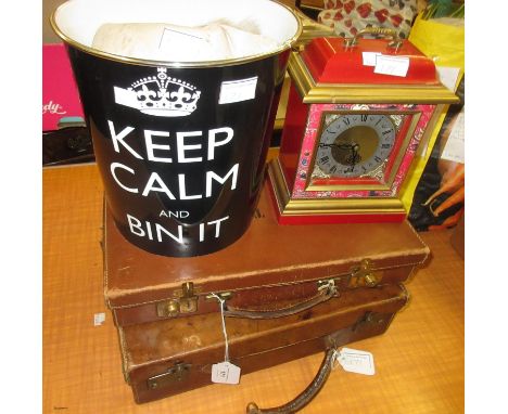 Leather attache case with brass locks and key, small leather suitcase, small sheepskin rug, a reproduction waste paper bin an