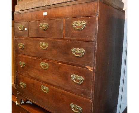 19th Century oak chest of three short over three long graduated drawers with brass handles, raised on bracket feet 