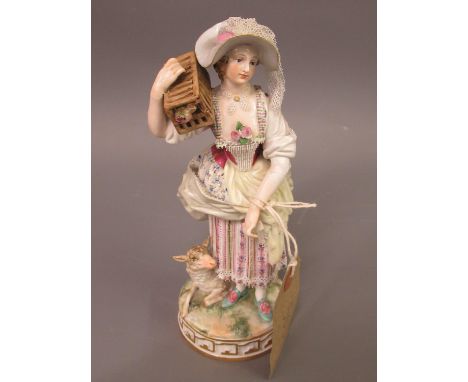 19th Century Meissen figure of a girl carrying a bird in a cage, a lamp at her feet, blue cross swords mark to the base, 7.25