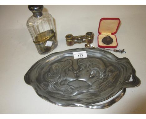 Art Nouveau pewter oval dish decorated with male and female portraits, silver mounted hip flask with plated cup, pair of oper