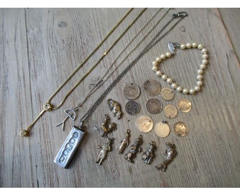 Silver pendant on chain , quantity of various metal charms, quantity of drilled silver coins, cultured pearl bracelet and a g