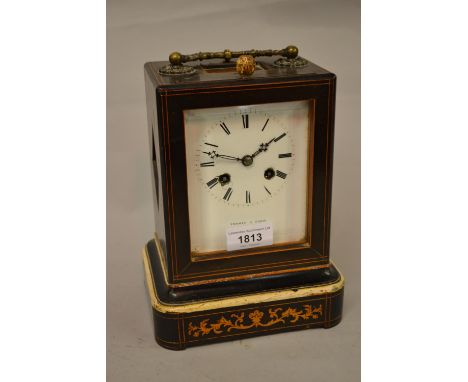 19th Century French ebonised and inlaid mantel clock, the rectangular case enclosing an enamel dial with Roman numerals, sign