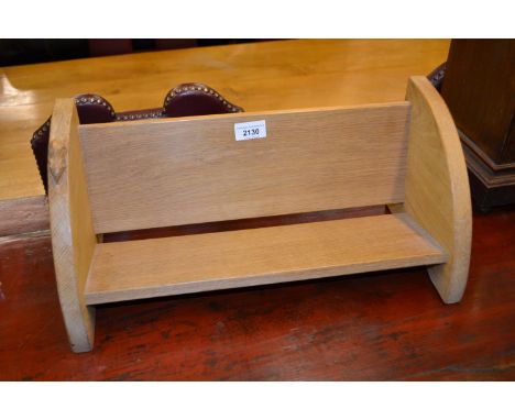 Robert Thompson (Mouseman), oak book rack with carved mouse signature 
