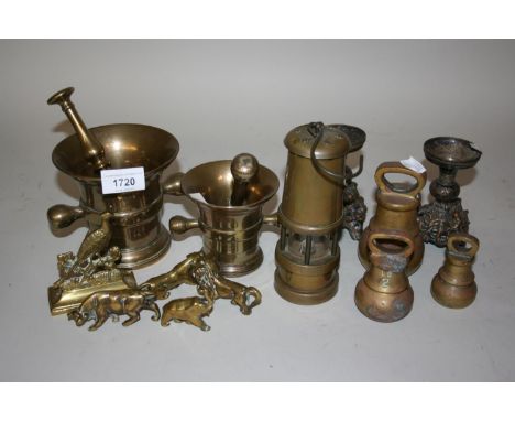 Two brass pestles and mortar together with a miner's lamp and other metalware 