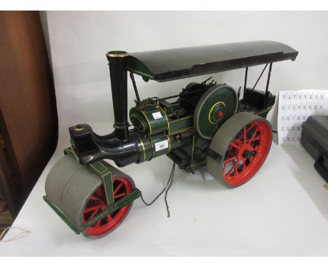 Painted wooden and metal model of a steam traction engine, 30ins long approximately 