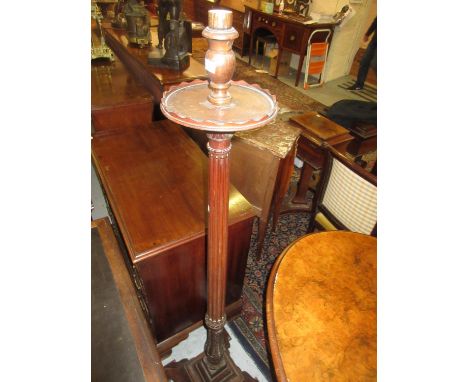 Early 20th Century mahogany standard lamp with a carved turned and fluted column 