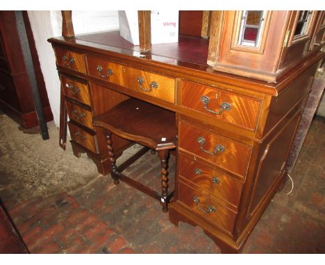 Reproduction mahogany twin pedestal desk with a red leather inset top above nine drawers with bracket feet together with a re