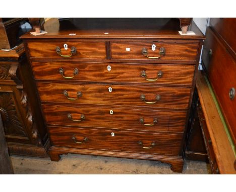 George III mahogany straight front chest of two short and four long drawers with brass swan neck handles, raised on bracket f