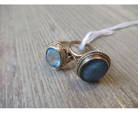 9ct Gold and opal set ring together with a 9ct gold blue zircon ring 