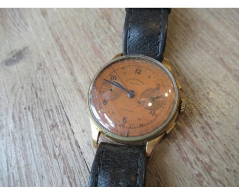 18ct Gold cased chronographe Suisse automatic wristwatch, the coppered dial with twin subsidiaries and sweep seconds on a lea
