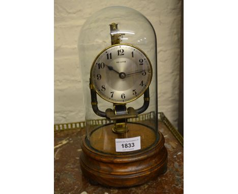 Bulle electric mantel clock under a glass dome with wooden plinth 