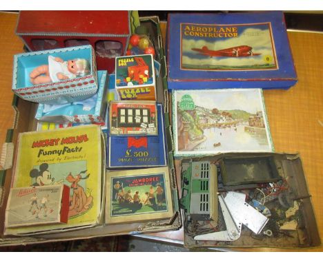 Box containing a quantity of various vintage children's toys including a Victory jigsaw puzzle, aeroplane construction kit in