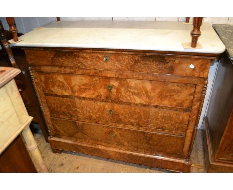 French walnut commode having white marble top with four drawers flanked by spiral turned pilasters on a plinth base with low 