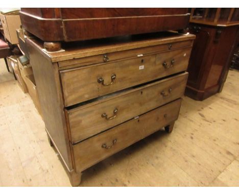Regency mahogany straight front chest with a reeded top above three drawers with brass swan neck handles and bracket feet 