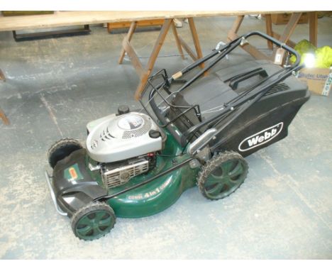 A Webb " 4 in  1 " combi petrol rotary lawn mower.