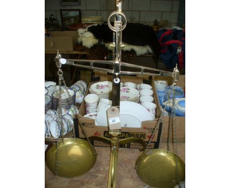 A Set of brass W T  Avery 4 lb balance scales complete with pans.
