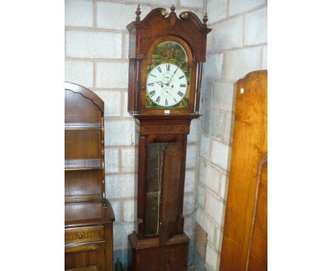 A Victorian mahogany cased eight-day longcase clock
The arched upper pediment surmounted by three turned finials, the glazed 