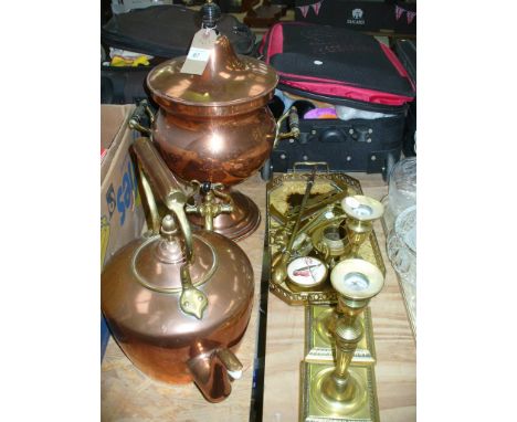 A 19th century copper samovar with ebonised turned finial and side handles, brass tap and raised on a circular base, a Victor