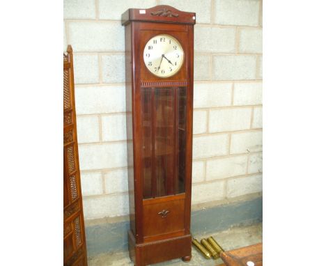 A 1930's Walnut cased longcase clock with a silvered dial signed DUFA  with three brass cased weights , raised upon front bun