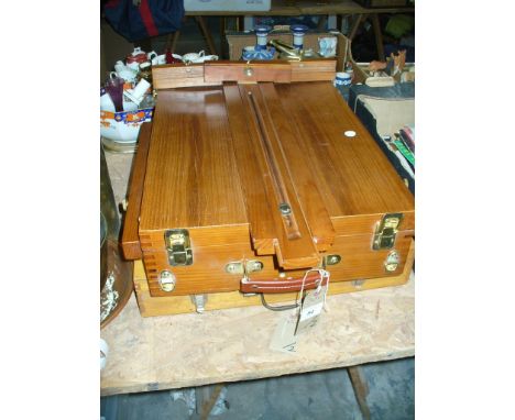 A Collection of artists oil paints to a folding easel paint box and a collection of oil paints to a second box. (2)