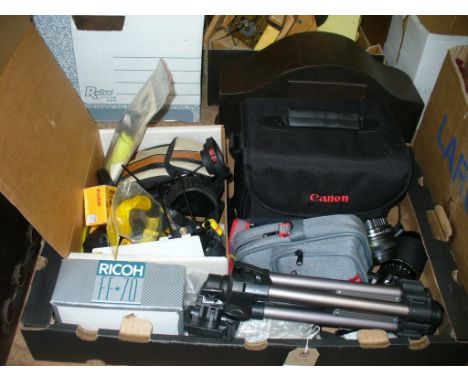 A Collection of Cameras and camera equipment including a tripod, Canon lenses, a Pentax P30 camera, qty.