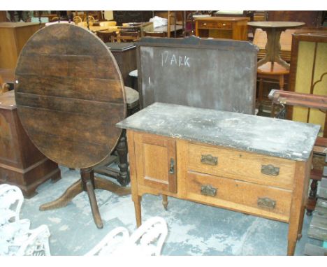 A Late Victorian marble top oak washstand and a Georgian oak tripod table.(2)