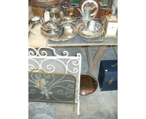 A Semi lobed four piece plated tea set, egg cruet, pewter coffee pot, quartz carriage clock, Halina cased camera, mantel cloc