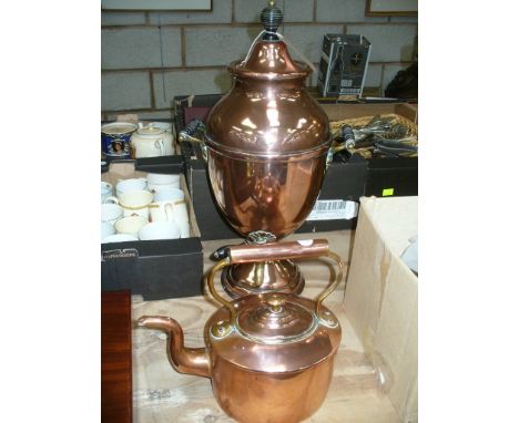 A 19th Century copper samovar with a turned ebonised finial and handles and a Victorian copper kettle with a button finial. (