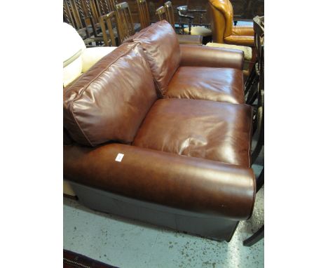 Modern tan leather two seater sofa.