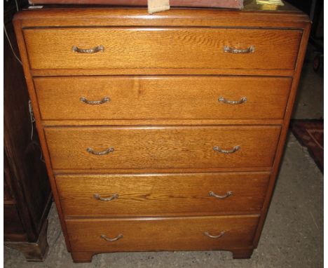 Mid 20th Century oak chest of five long drawers on bracket feet.