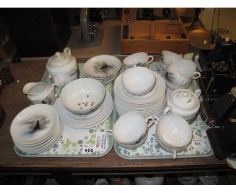 20th Century Japanese eggshell porcelain tea service, the cups with lithophane portrait bases.