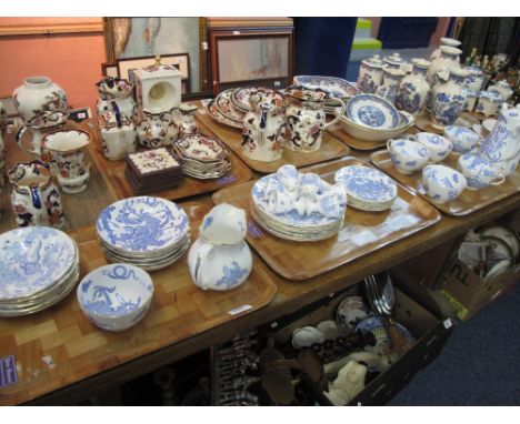 Three trays of Royal Worcester china blue and white dragon design tea and dinner ware items to include cups and saucers, egg 