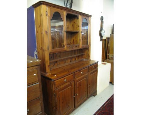 Modern natural pine cabinet back dresser on bracket feet.