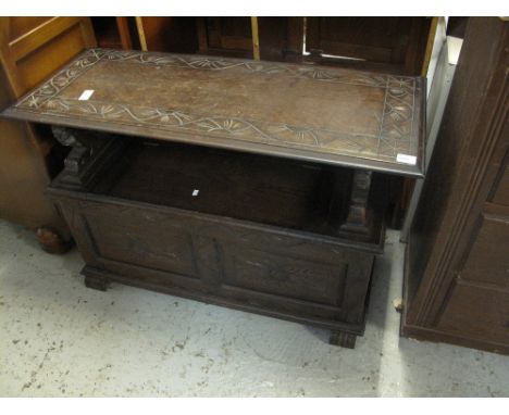 Reproduction oak carved monks bench.