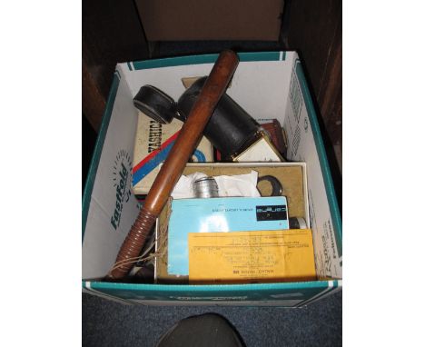 Box of assorted items to include oak policeman's truncheon, yashica 8mm movie camera in original box, modern mantle clock, la