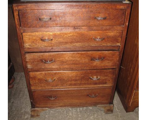 Mid 20th Century oak bedroom chest of five long drawers on bracket feet.