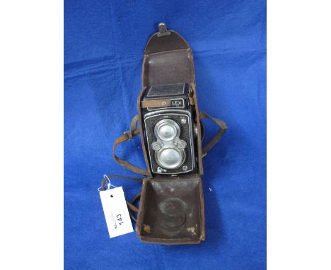 Rolleiflex twin lens reflex camera with leather Eveready case.