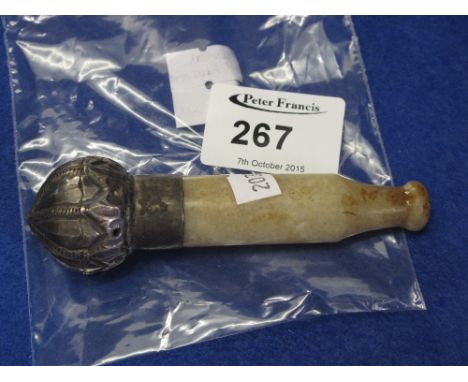 Oriental hard stone whistle or pipe with dome shaped white metal bell. *** CONDITION REPORT: Light wear but no obvious damage