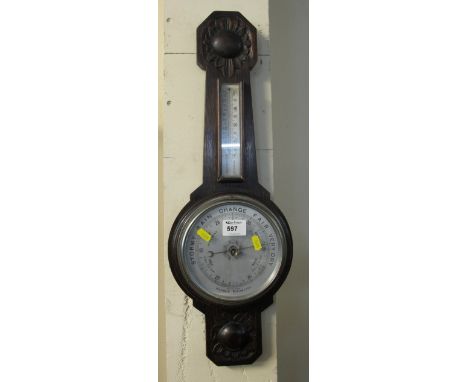 20th Century stained oak and carved aneroid wall barometer.