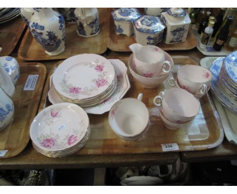 Tray of Shelley fine bone china No.823343 on a pink ground with floral and foliate decoration comprising six cups and saucers